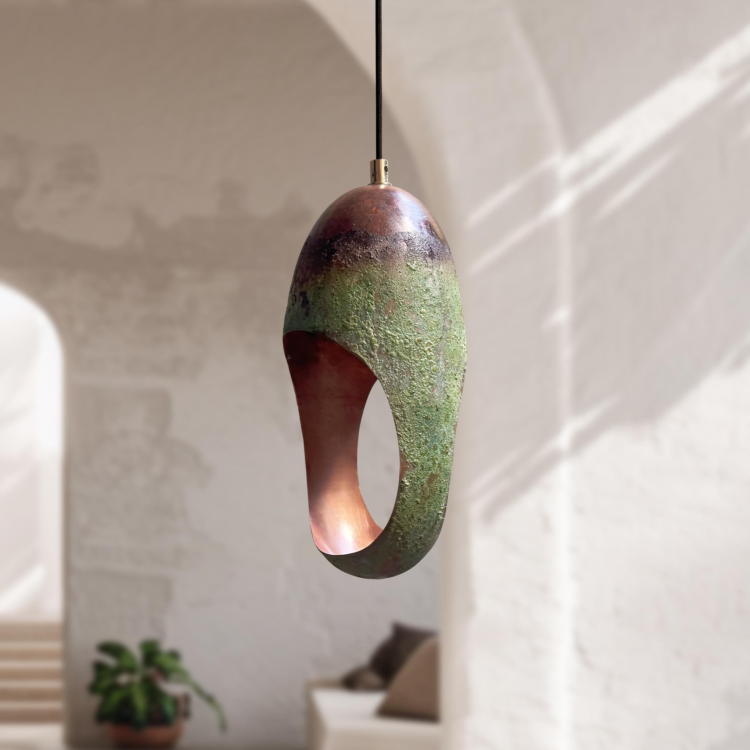 Handcrafted Oval Cut Copper Pendant Light with Green Patina